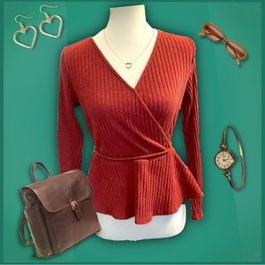 Burnt orange-red long sleeve wrap knit top